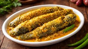 Bengali macher jhol, hilsa, or fish curry